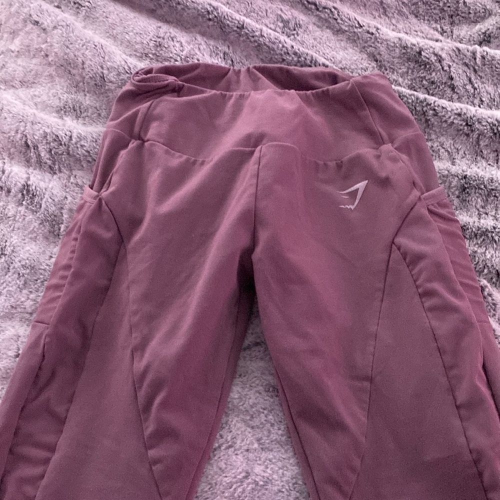 I am selling gym, shark, purple leggings, and I got them from the gym shark app